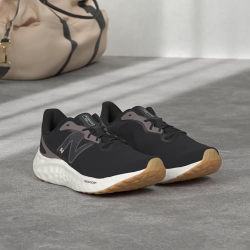 New Balance Women's Fresh Foam Arishi V4 Running Shoe, Black/Light Gold Metallic/Gum 2, 9.5